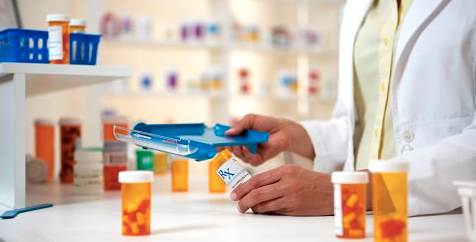pharmacist filling prescription