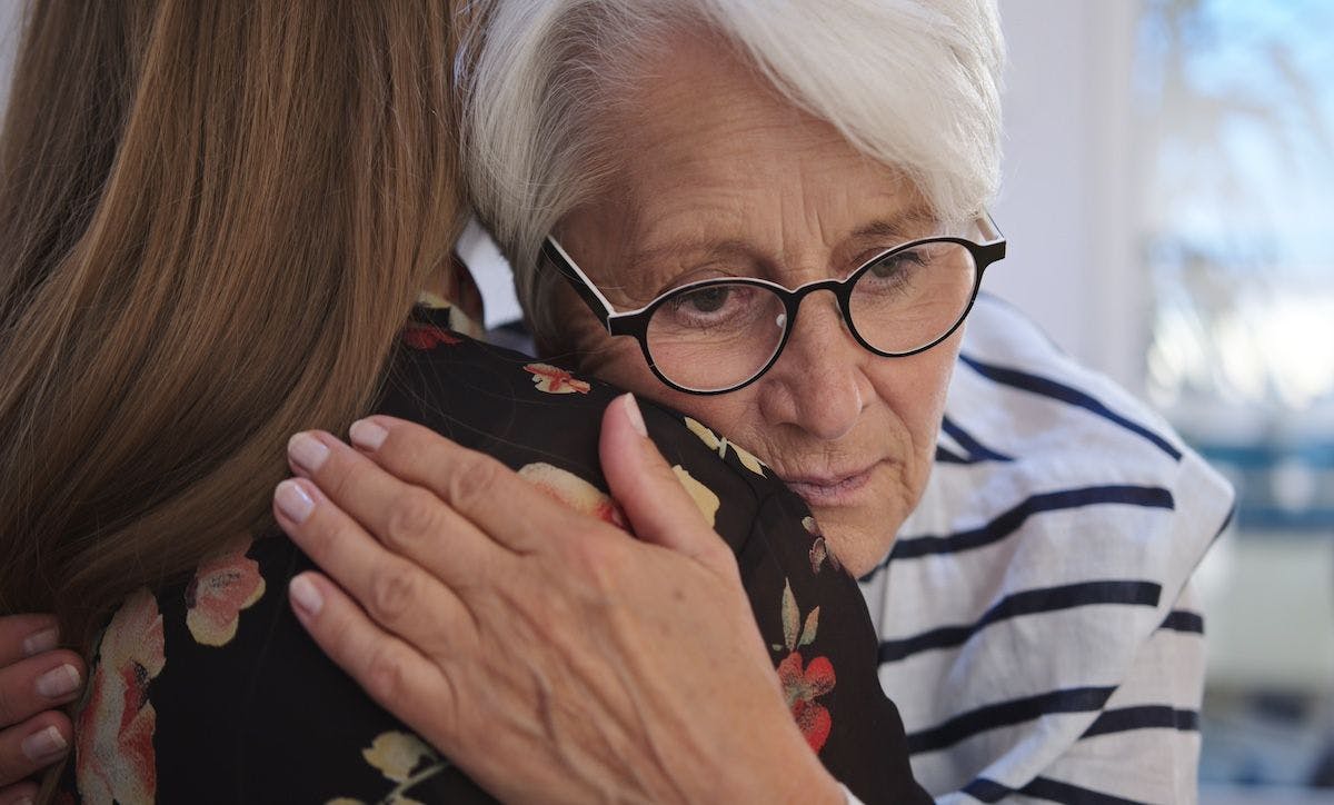 Patients consoling one another | Image Credit: CameraCraft - stock.adobe.com