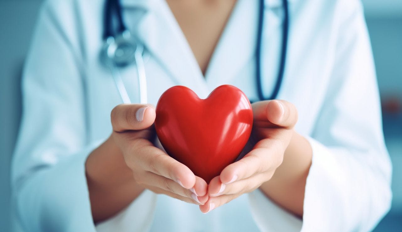 Doctor holding heart | Image credit: Pana Studio - stock.adobe.com