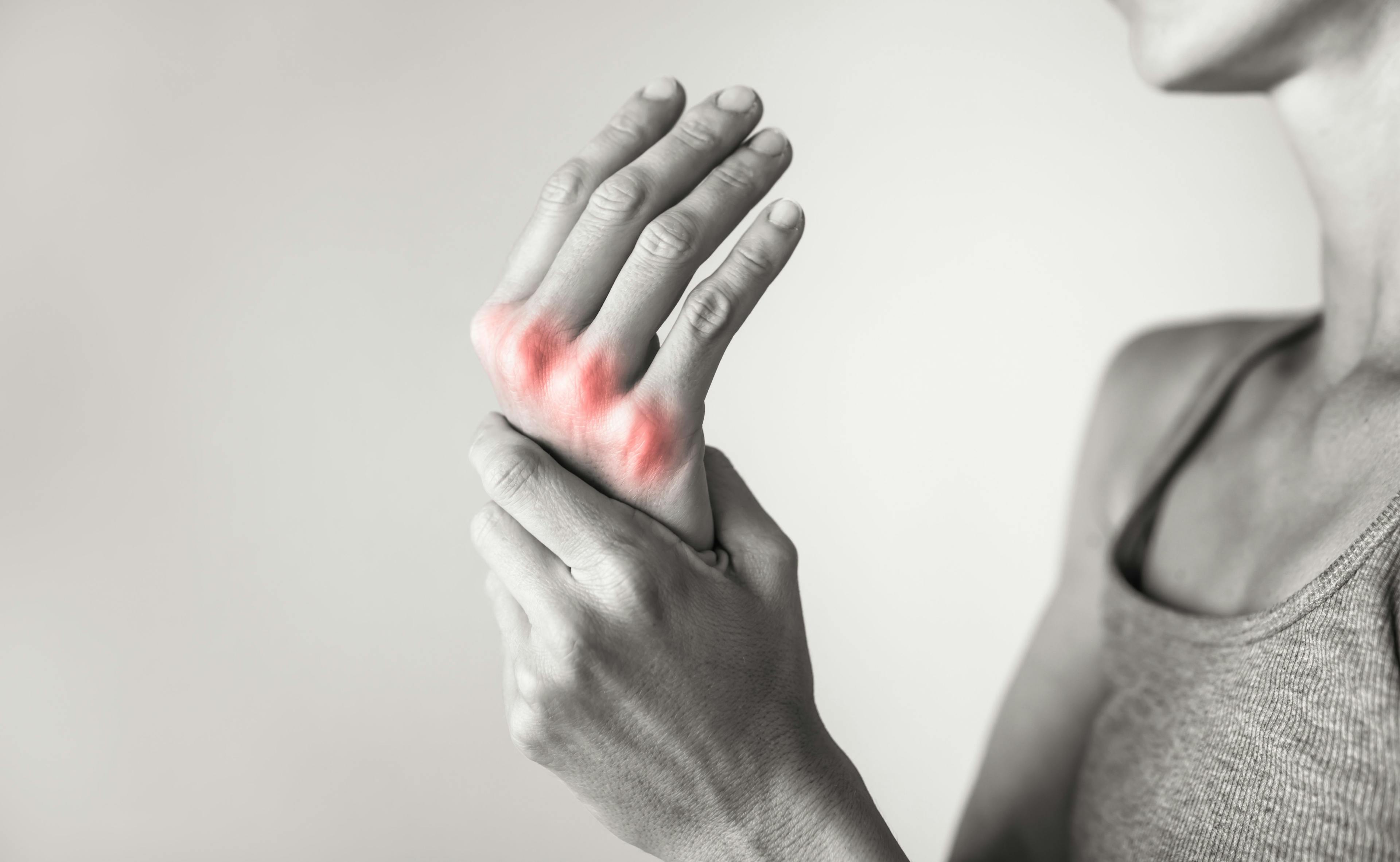 Woman Enduring Arthritic Pain in Hand | image credit: keiferpix - stock.adobe.com