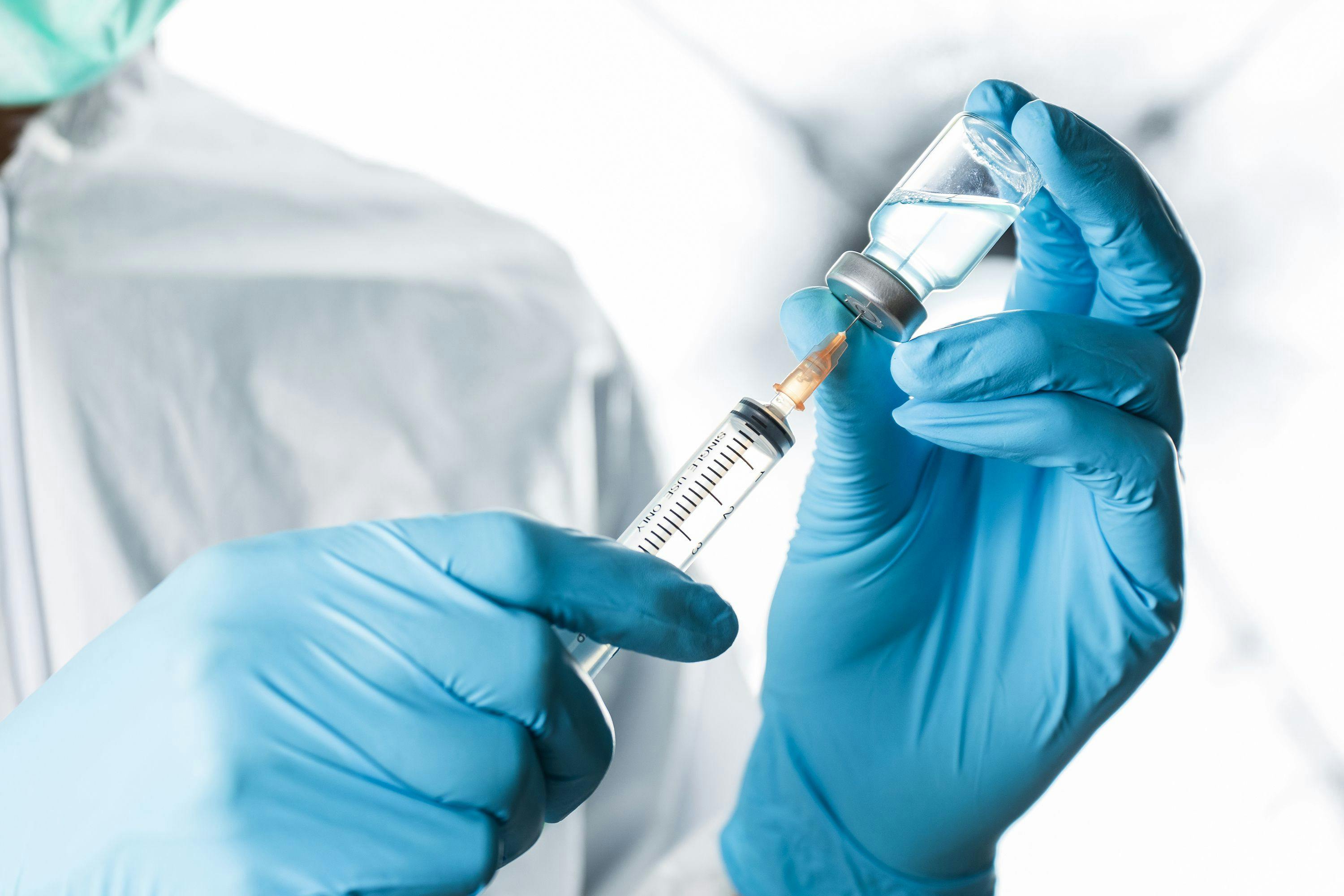 Filling a syringe with IV drug | Image Credit: PhotobyTawat – stock.adobe.com