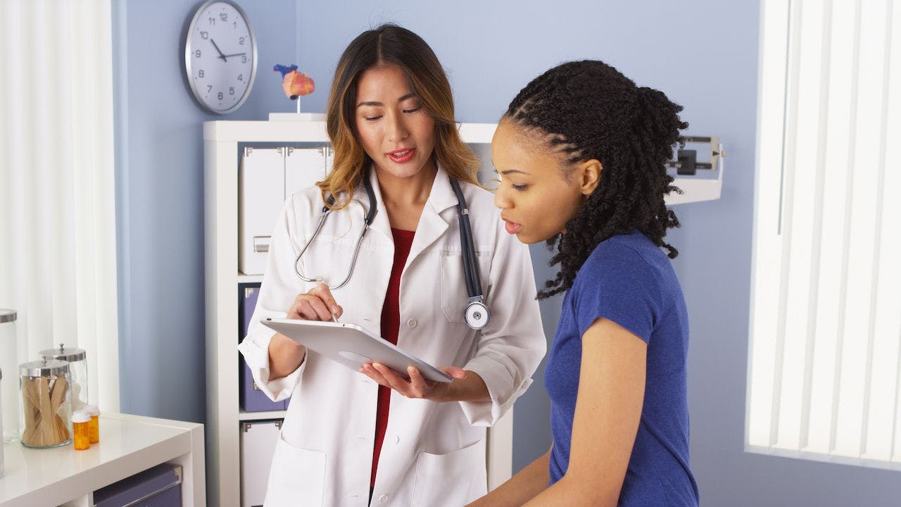 Provider speaking with patient | Image credit: rocketclips - stock.adobe.com