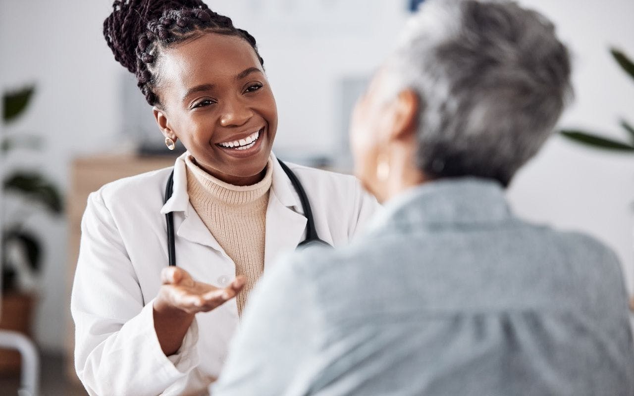 doctor consulting a patient in meeting in hospital for healthcare feedback or support-Happy medical or nurse with a mature person talking or speaking of test results or advice | Talia Mdlungu-peopleimages - stock.adobe.com