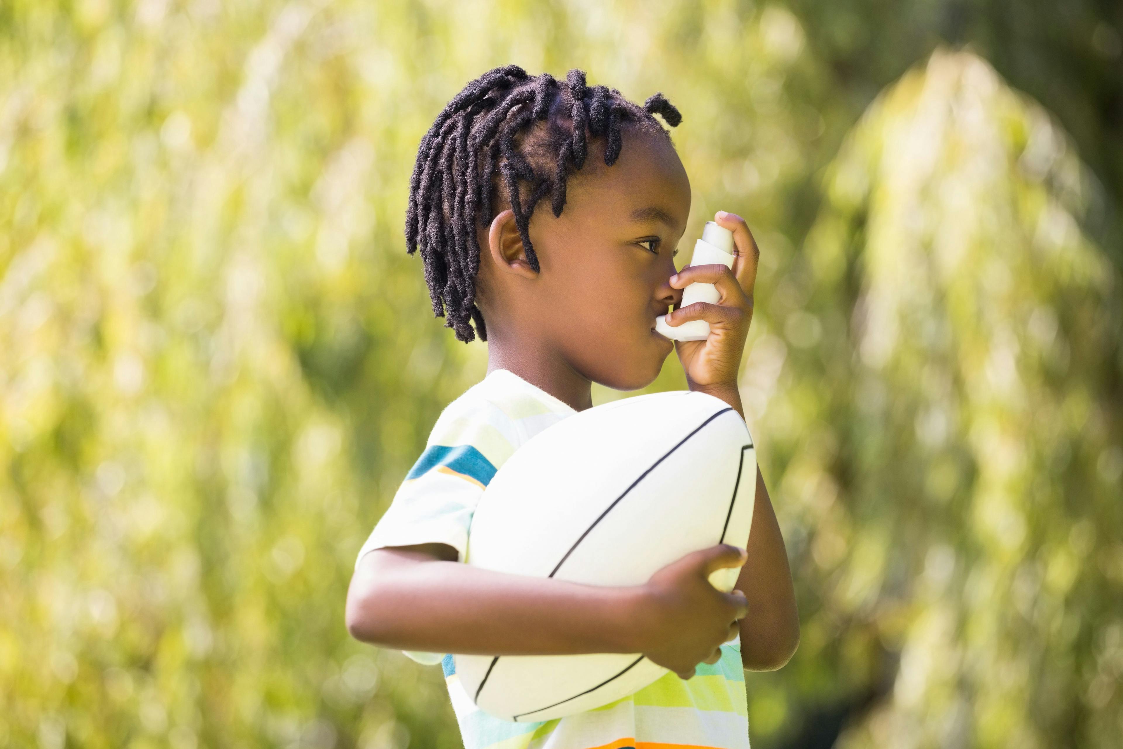 Child is using an asthma inhaler | Image credit: WavebreakmediaMicro - stock.adobe.com