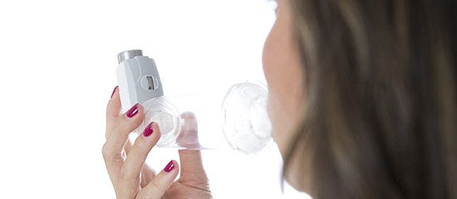 picture of woman with inhaler