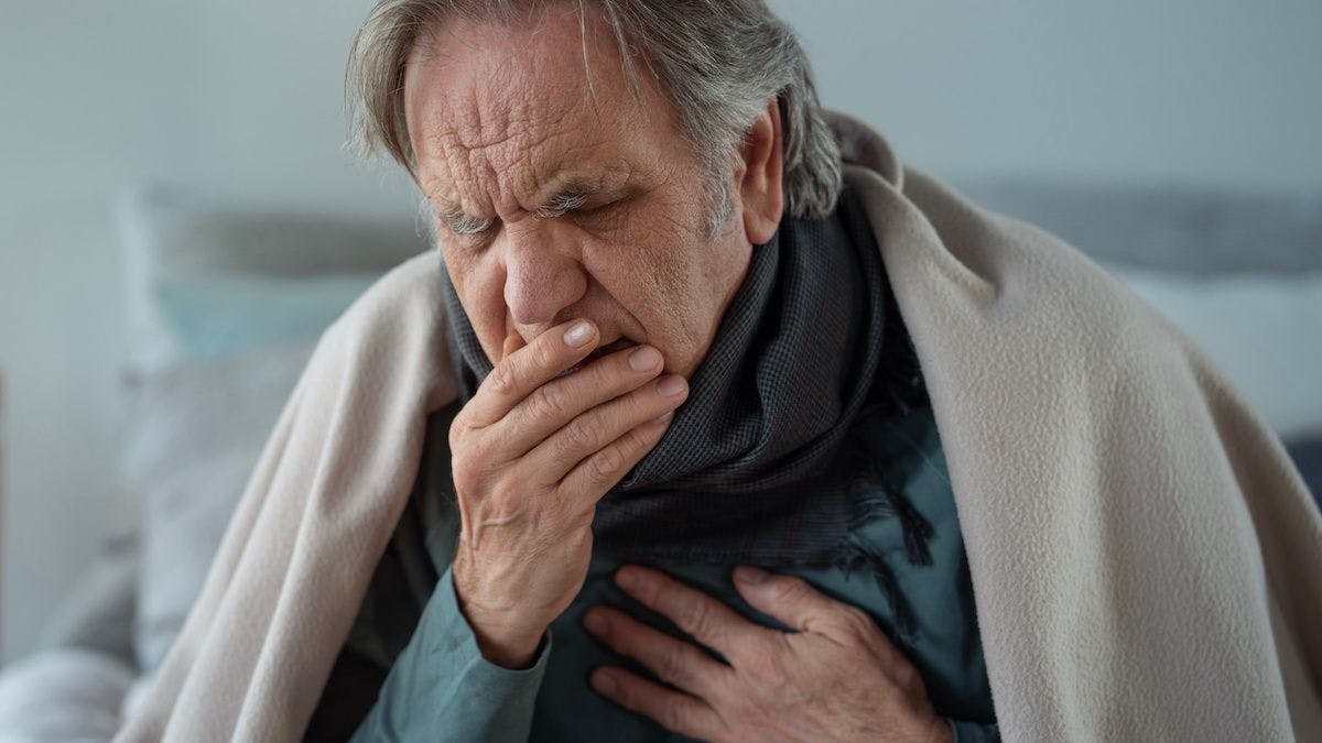 Older man with cough and cold | Image Credit: © sebra - stock.adobe.com