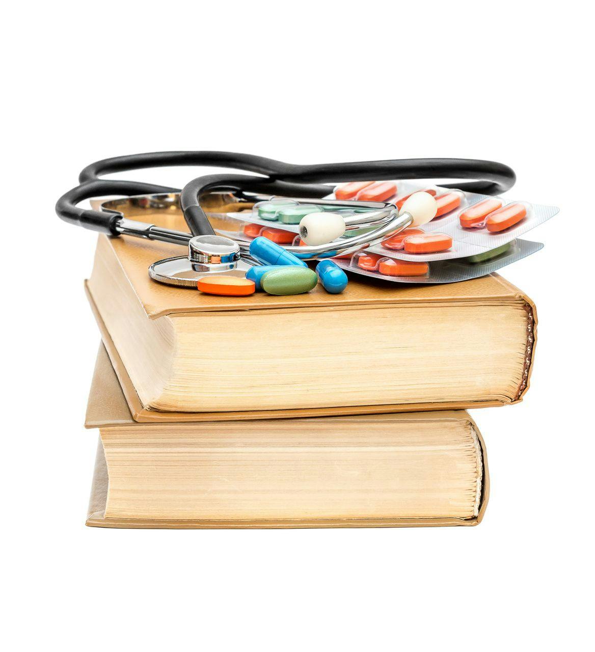 Book, stethoscope, medication