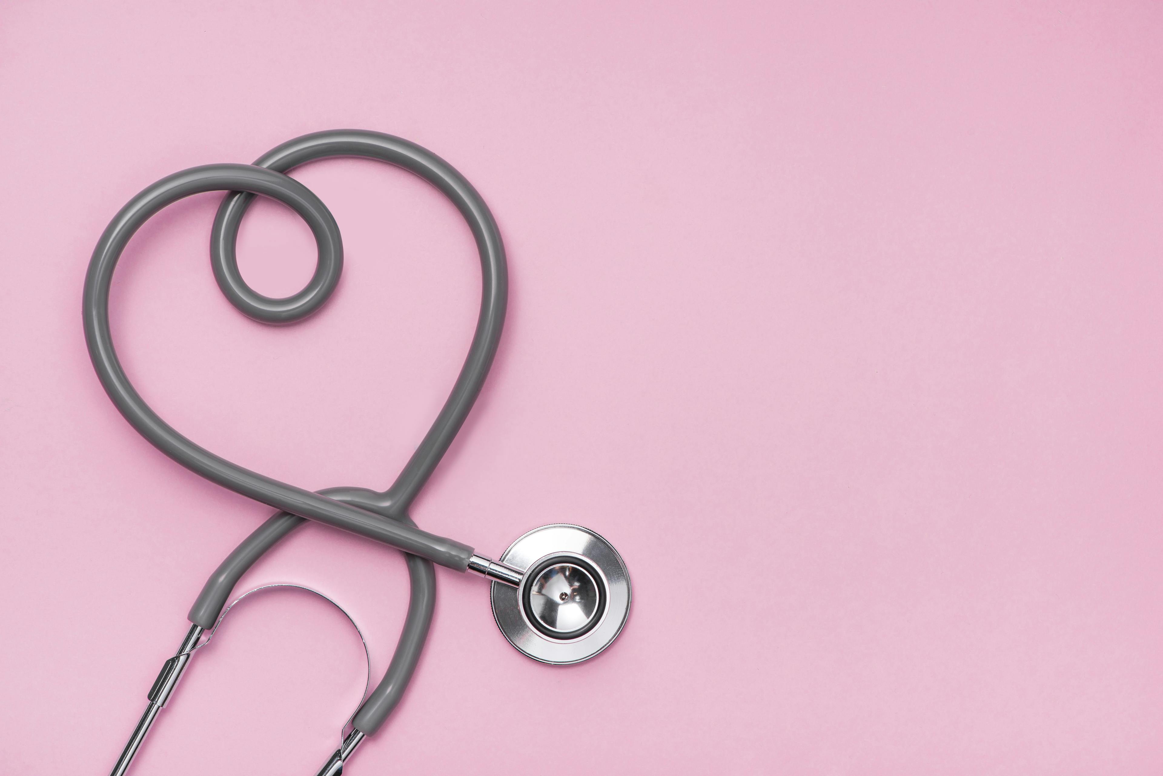 Stethoscope with heart shape on pink background | makistock - stock.adobe.cpm