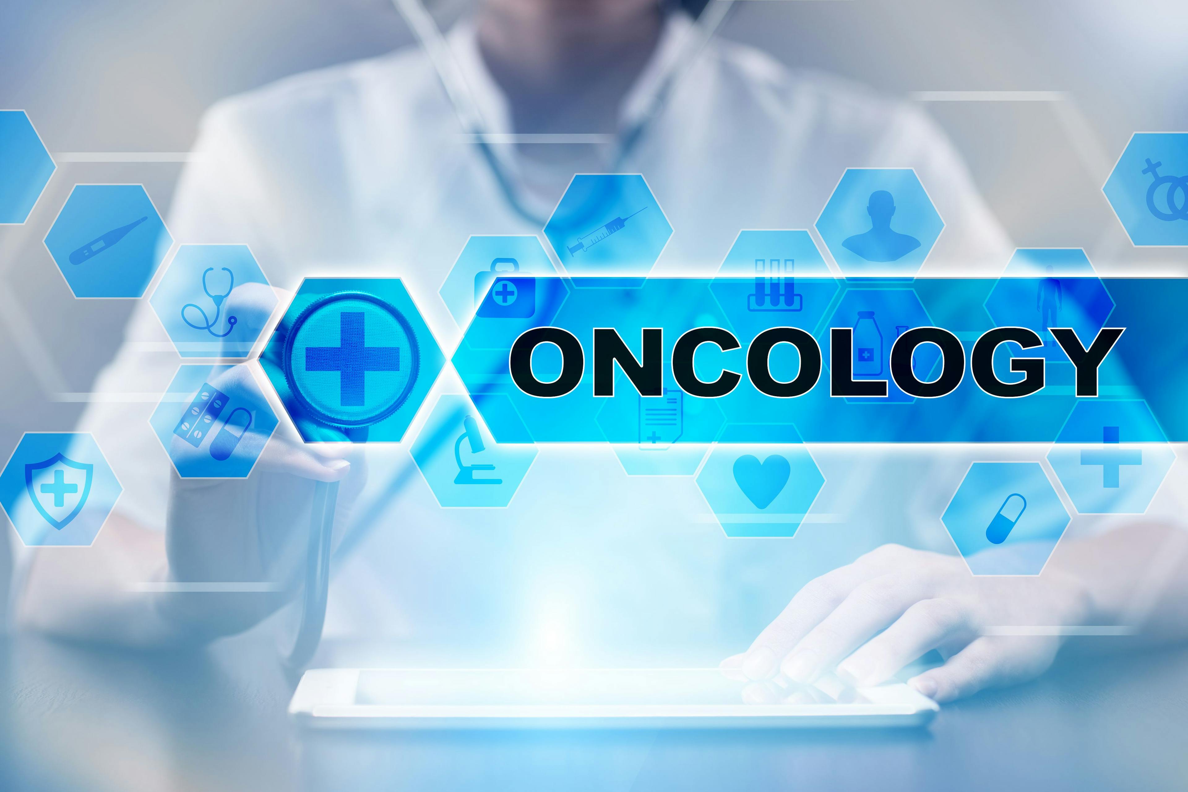Clinician Using Tablet Oncology Concept | image credit: WrightStudio - stock.adobe.com
