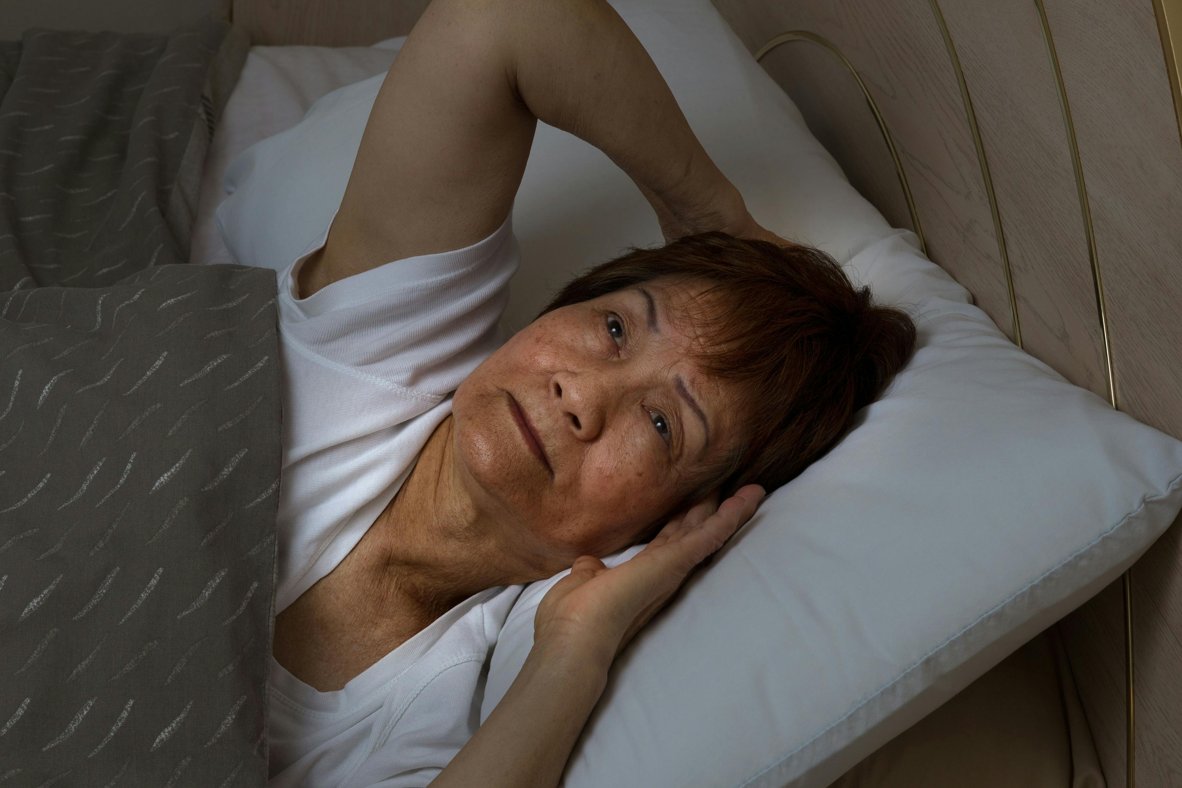 woman annoyed that she can't sleep