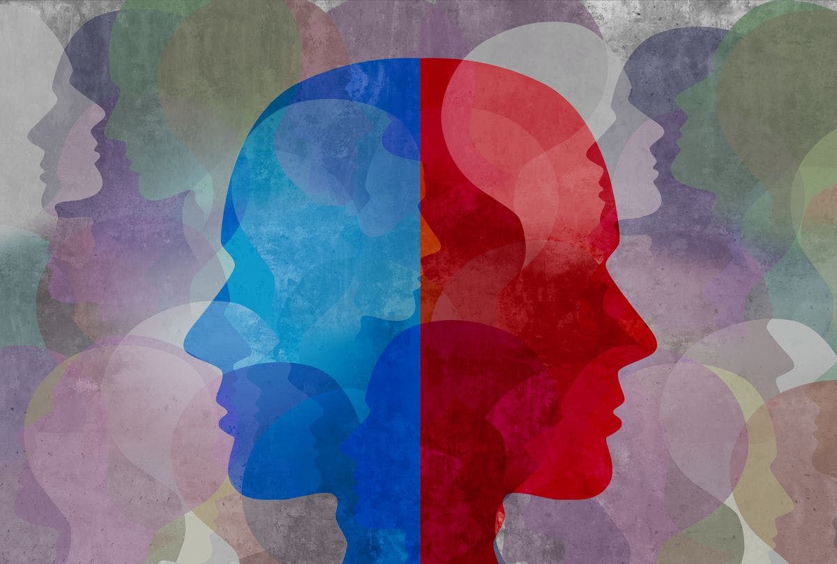 mental health image depicted by 2 side profile faces back to back, one red and one blue