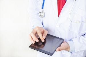 Doctor holding electronic tablet