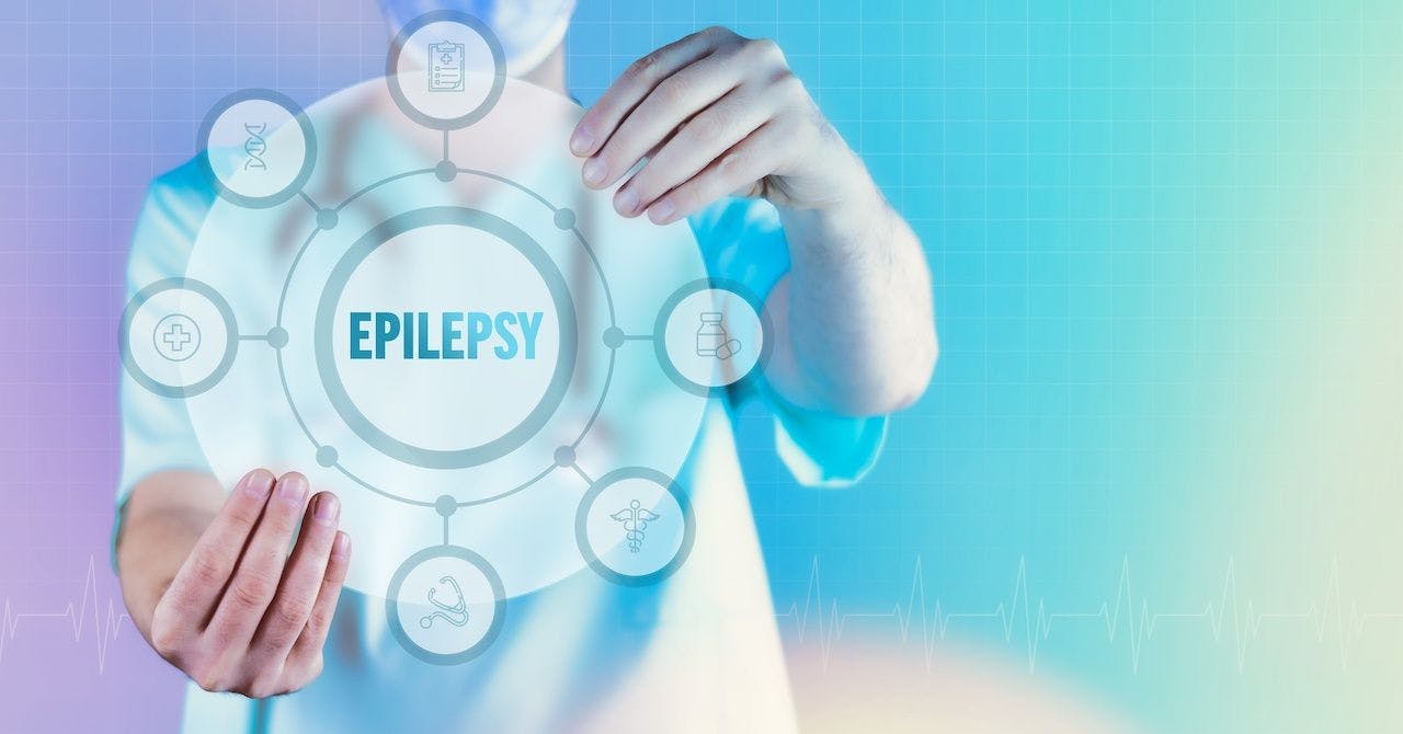 Epilepsy. Medicine in the future. Doctor holds virtual interface with text and icons in circle: © MQ-Illustrations - stock.adobe.com