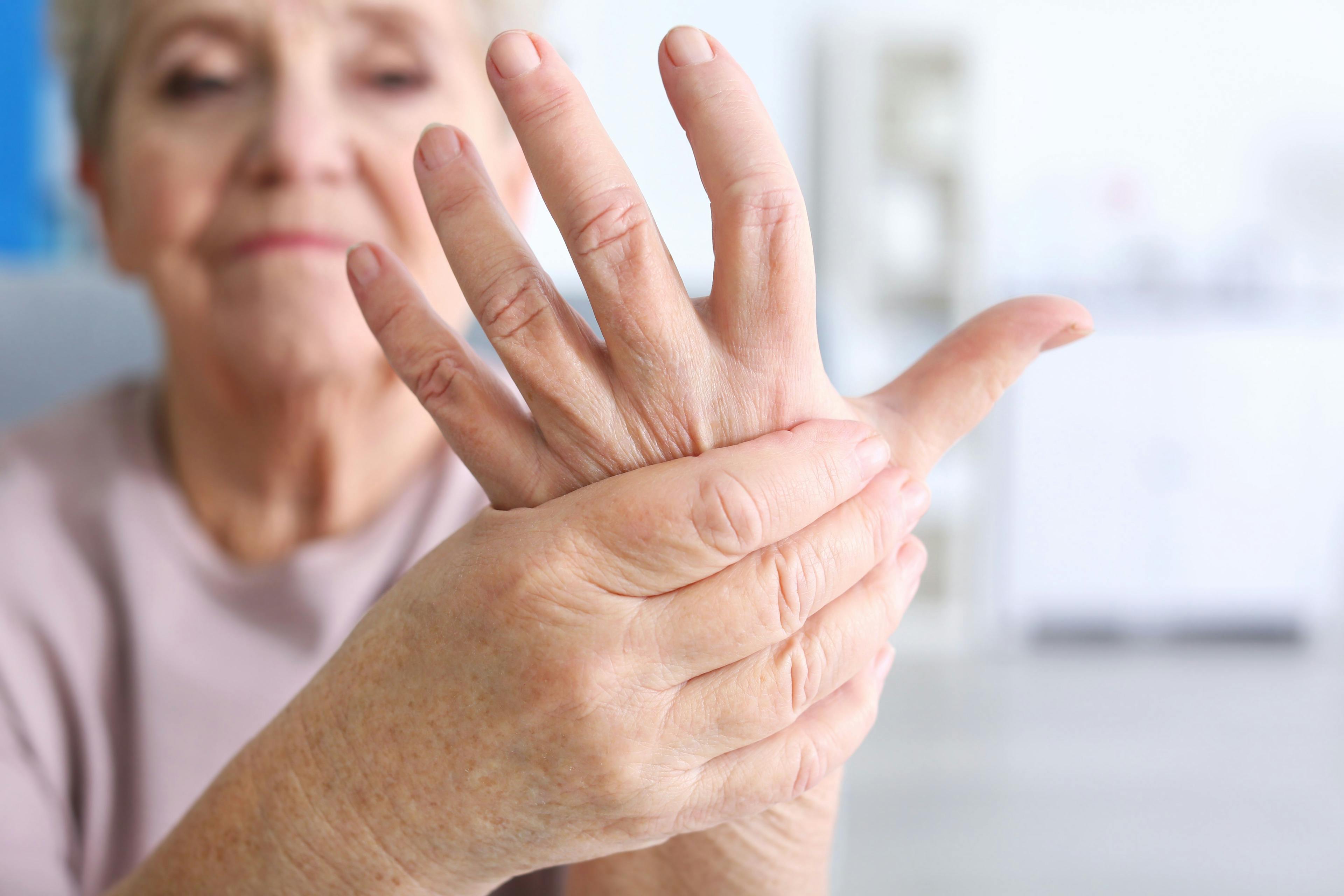 Older Woman Enduring Hand Pain | image credit: Africa Studio - stock.adobe.com