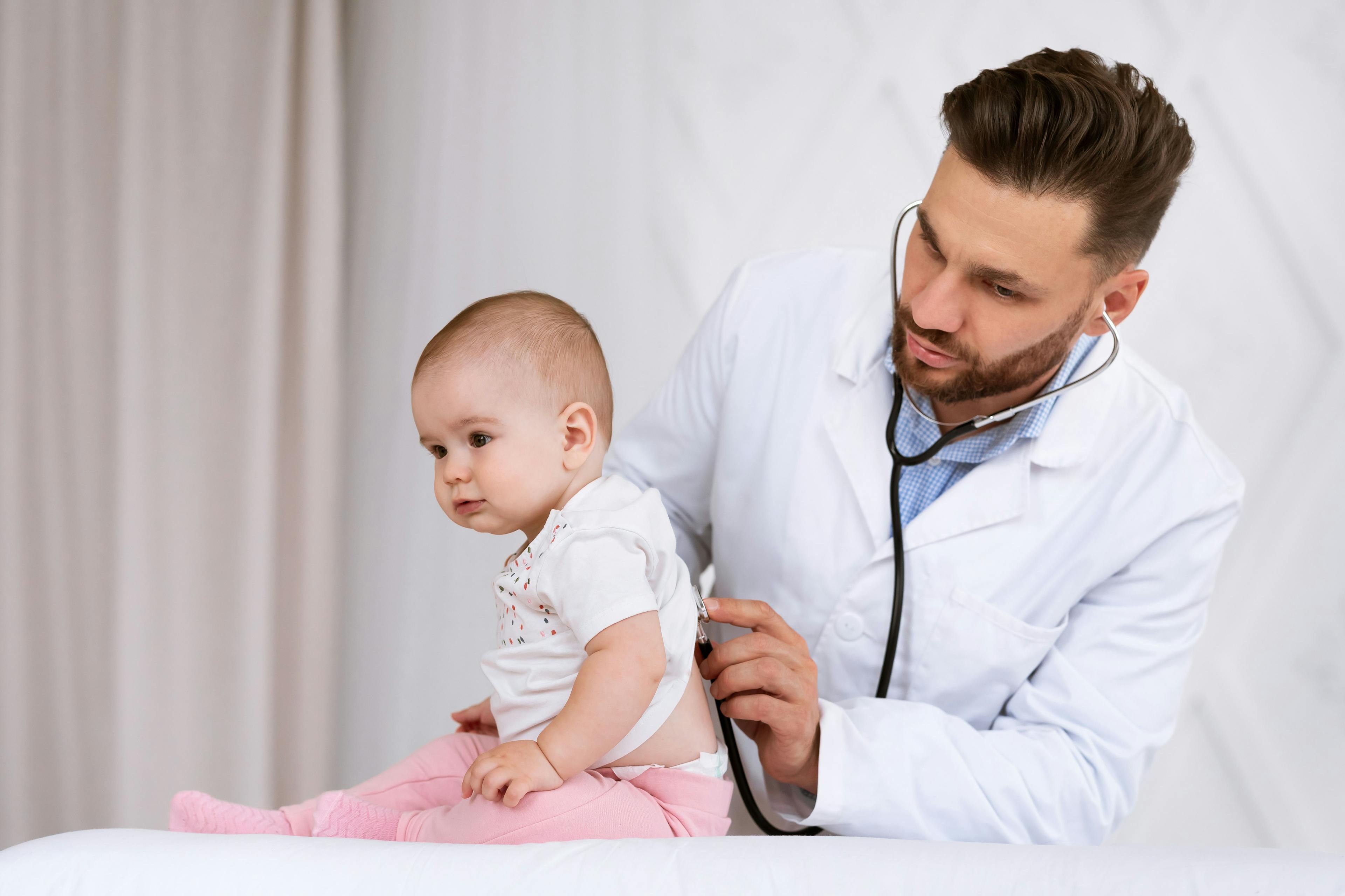 Doctor Examining Toddler Listening To Lungs With Stethoscope In Clinic | Image credit: Prostock-studio - stock.adobe.com