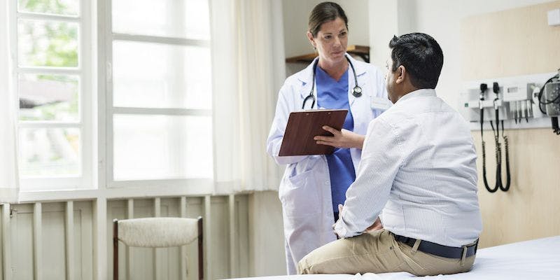 Image of a consultation between a doctor and a patient