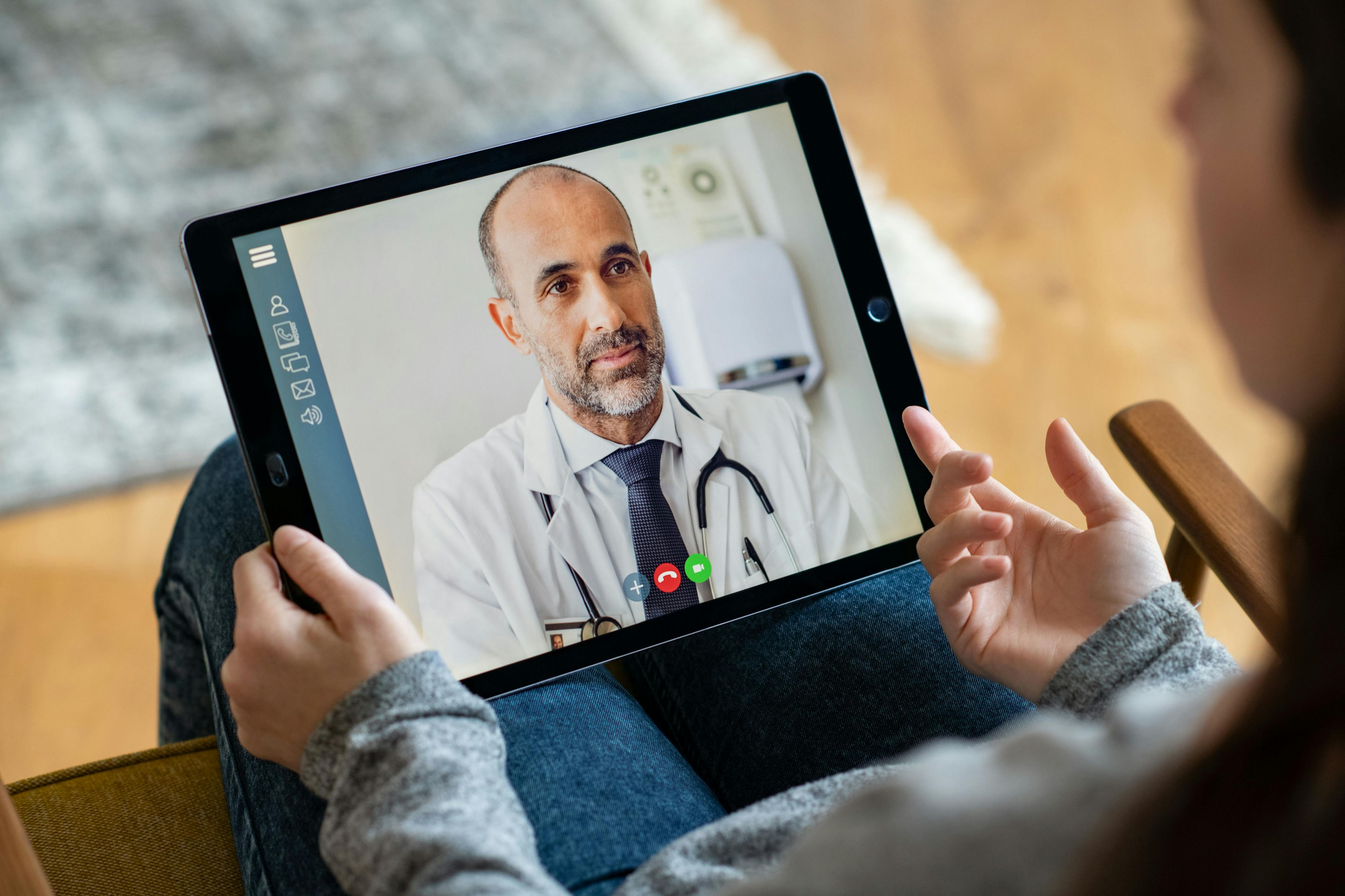 tablet with video of doctor