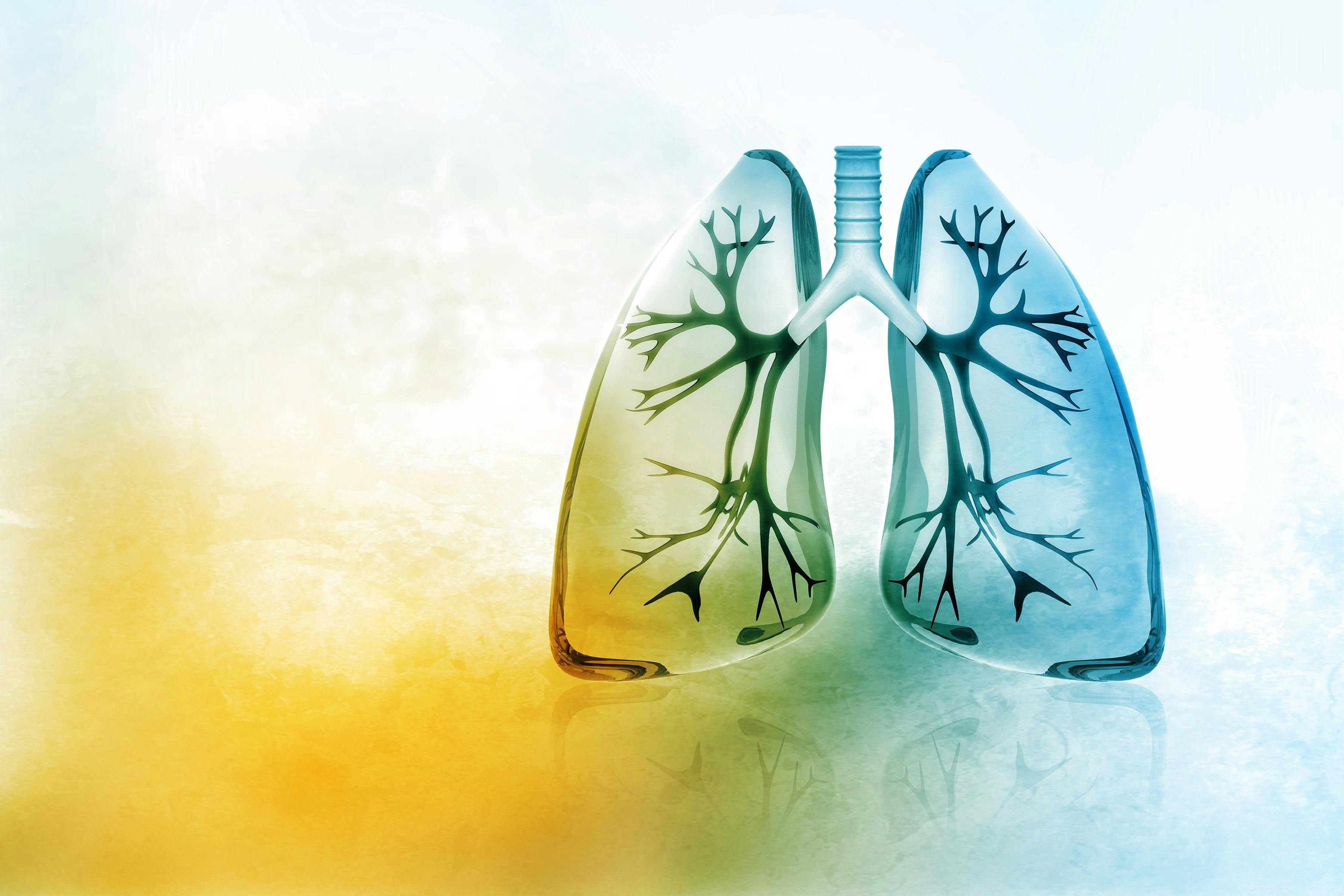 computerized image of lungs over a watercolor blue, yellow, and white background