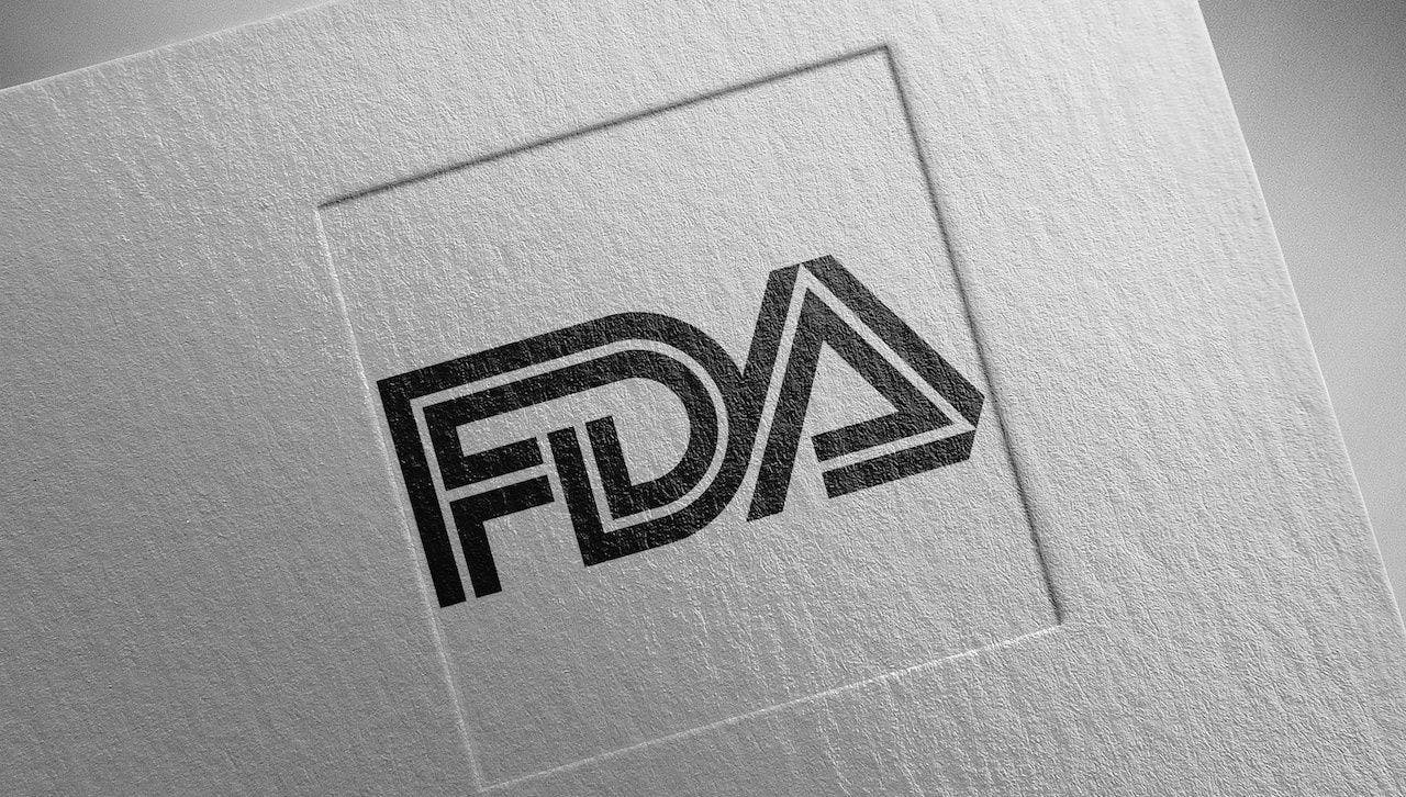 FDA in black lettering on gray background