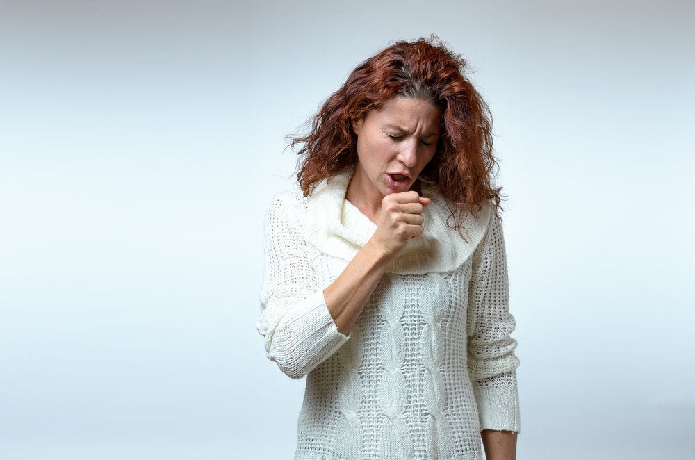 picture of woman coughing 
