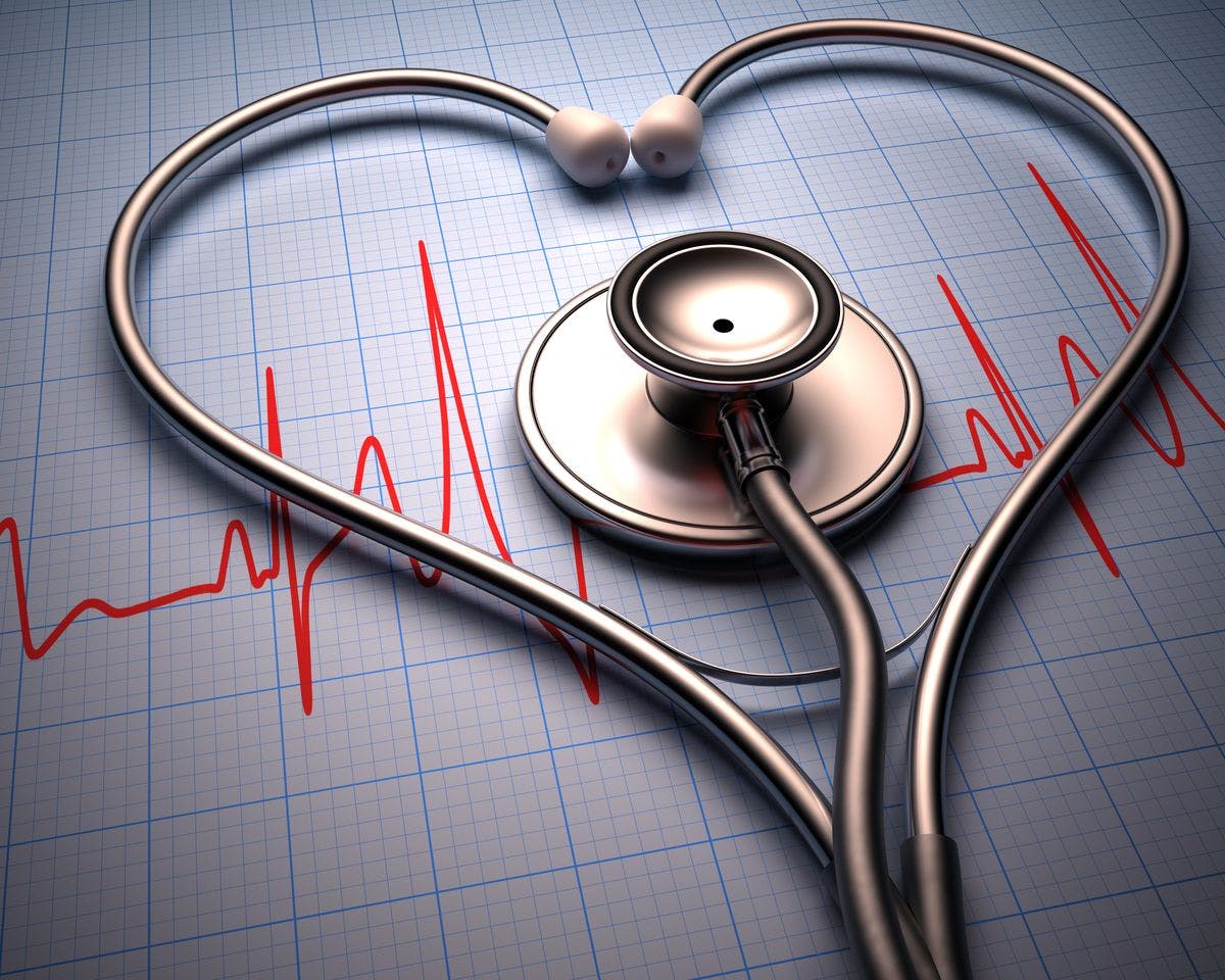 heart-shaped stethoscope on ECG