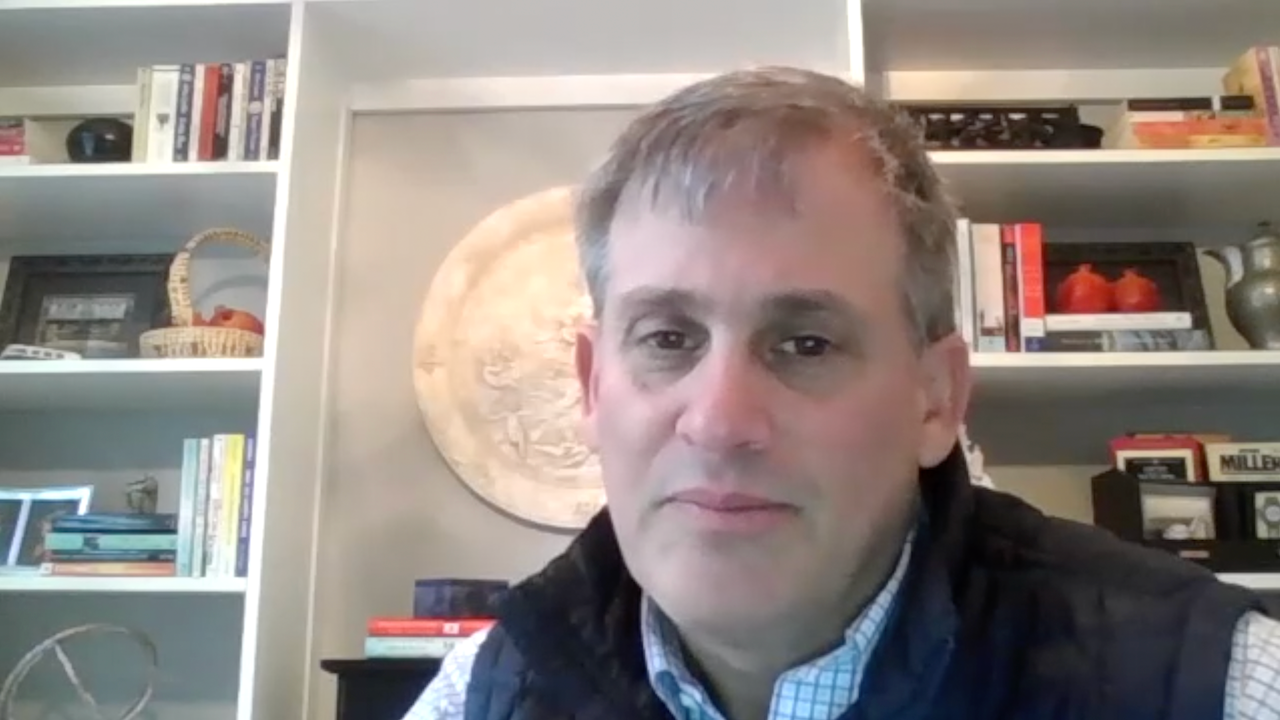Screenshot of Michael E. Chernew, PhD, in a video interview