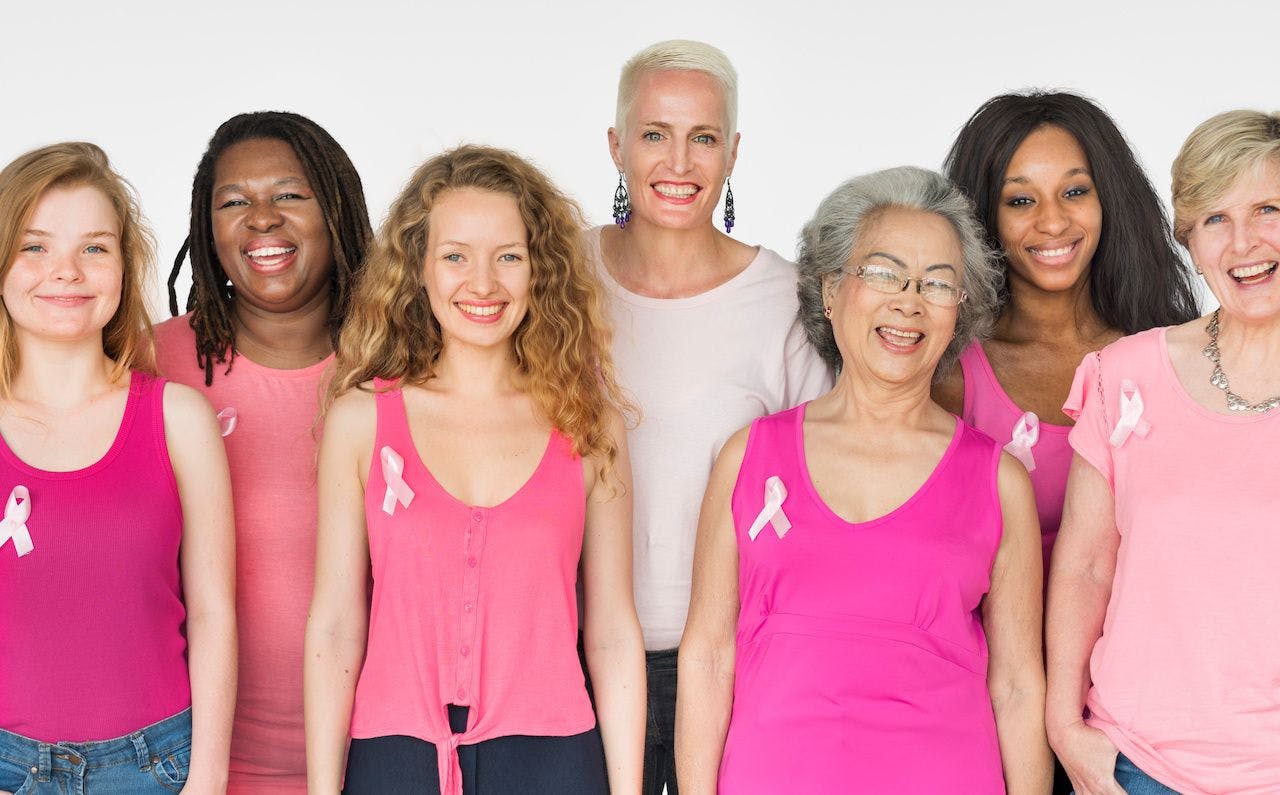 diverse group of women wearing pink for breast cancer | Image credit: Rawpixel.com - stock.adobe.com
