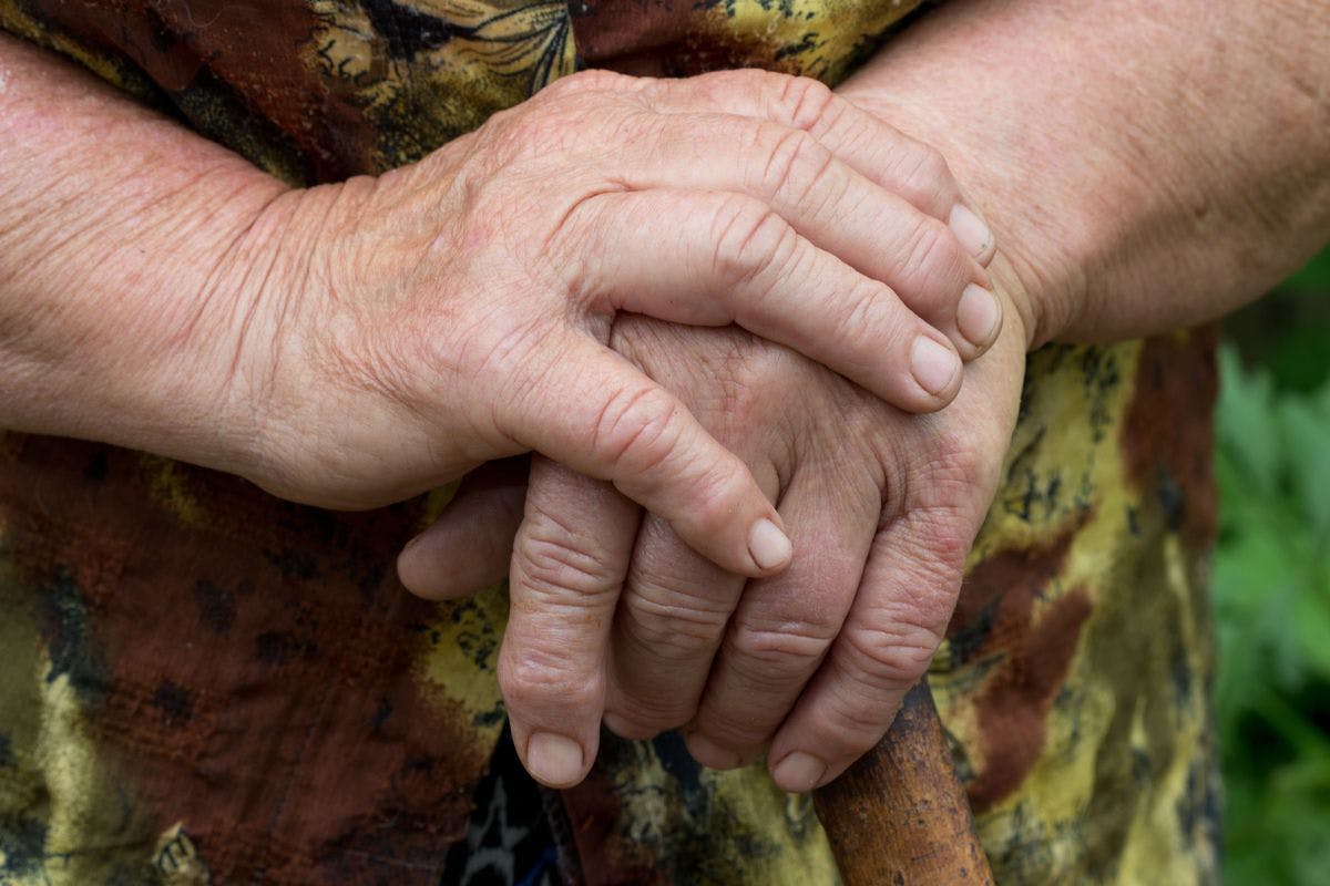 pair of hands of elderly person