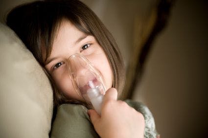 Picture of child with asthma mask on face