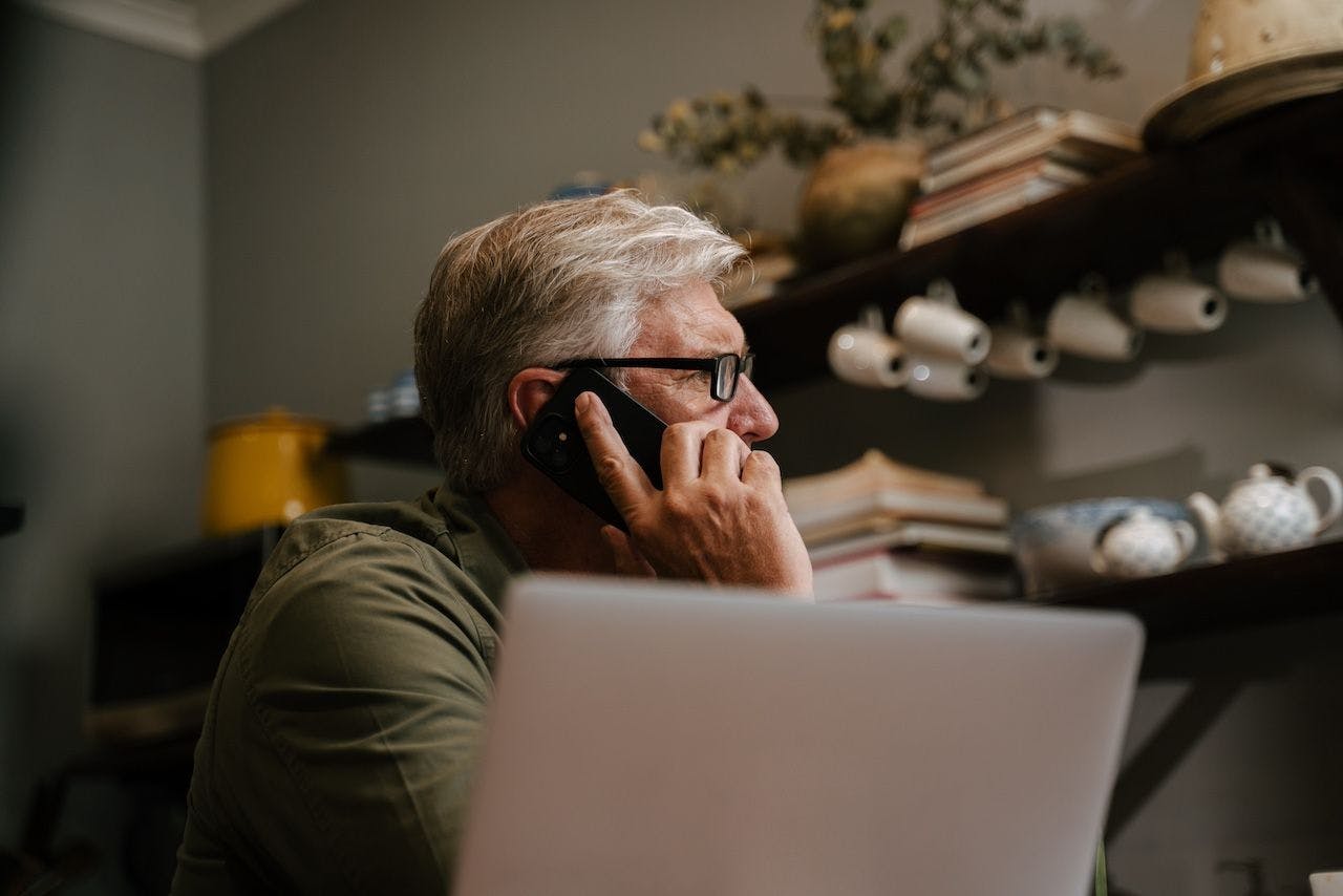 Caucasian elderly male on phone call stressed | Image credit: Prins Productions - stock.adobe.com