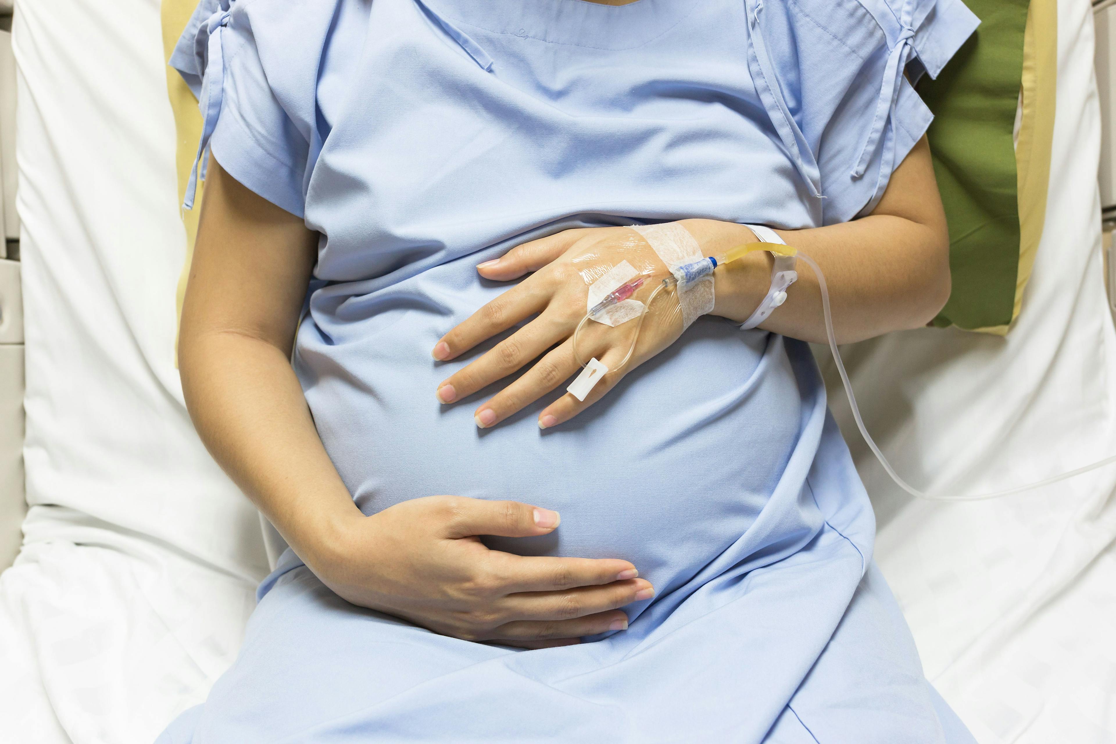 pregnant person in hospital bed