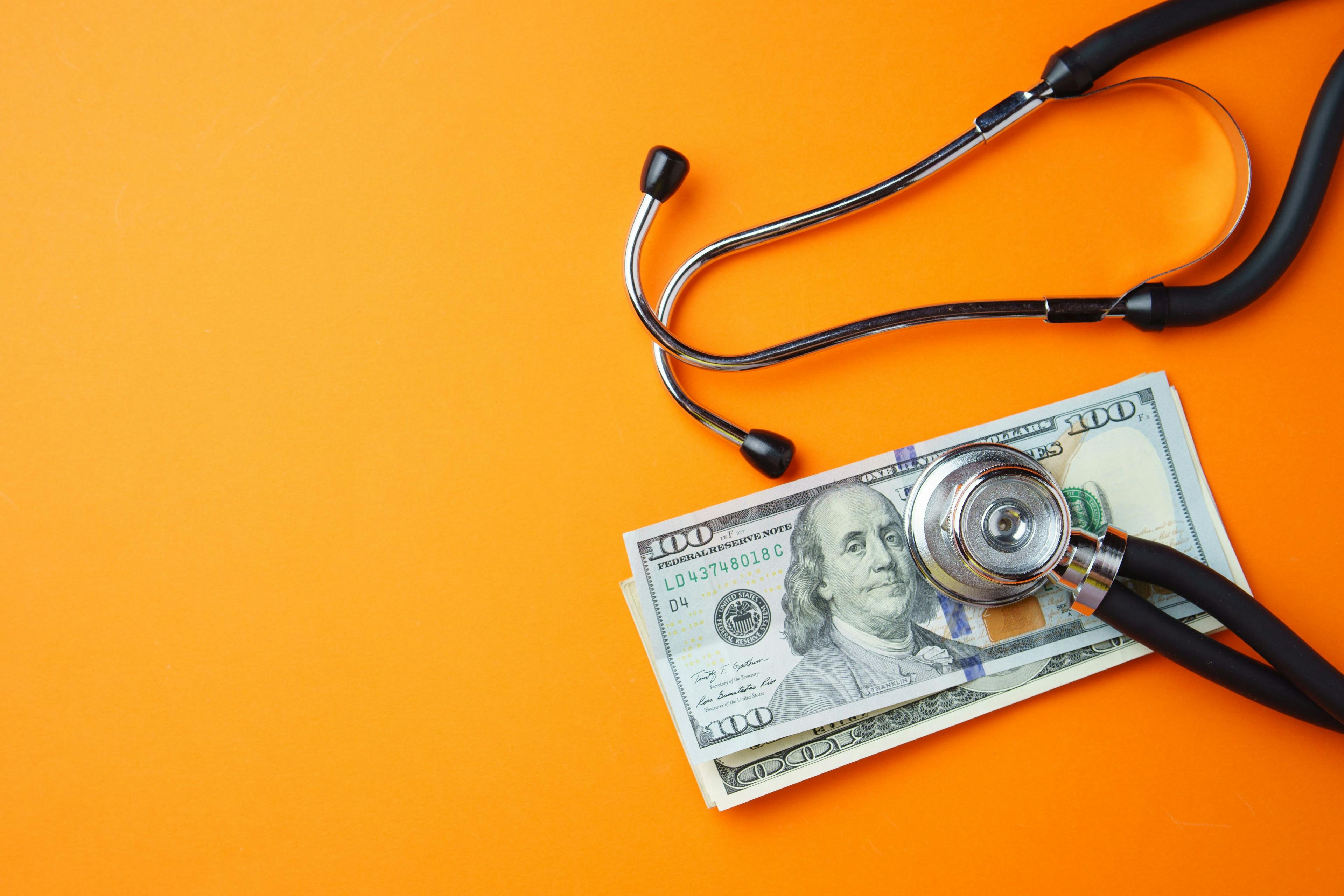 Medical stethoscope with money | Image credit: grek881 - stock.adobe.com