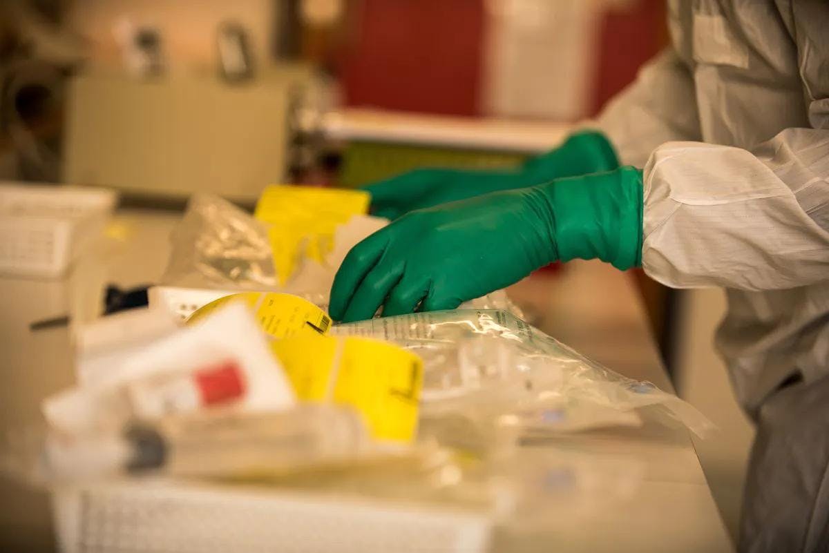 Lab workers preparing samples