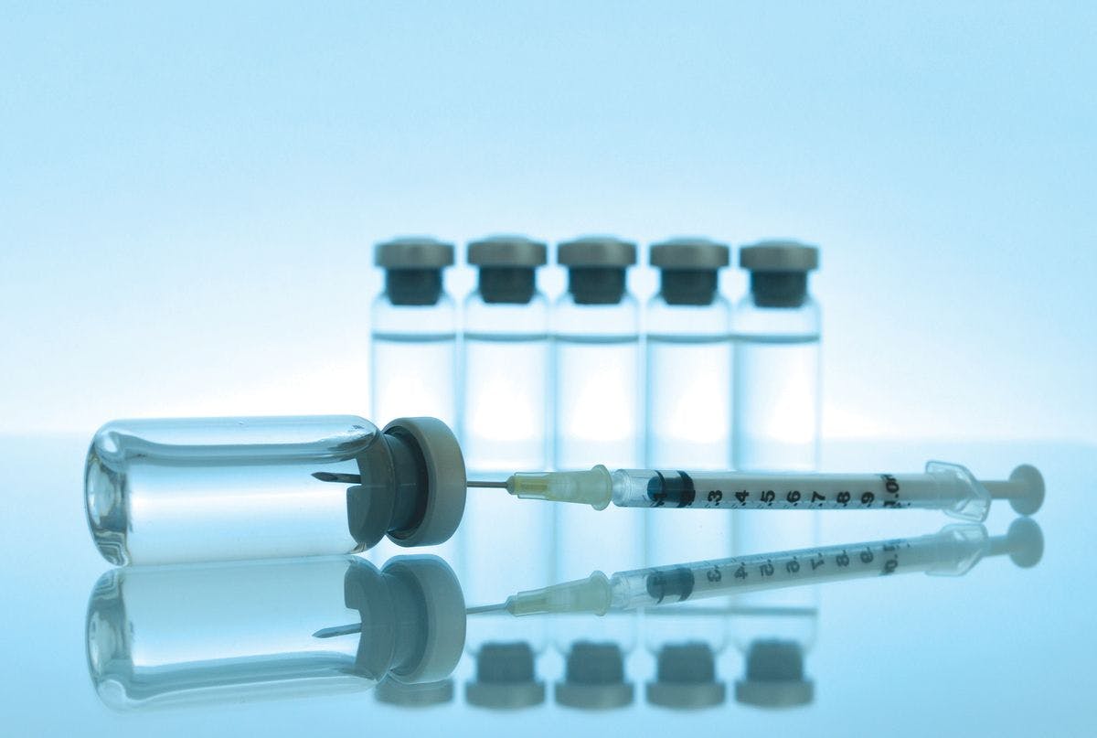 Vaccine syringe and vials