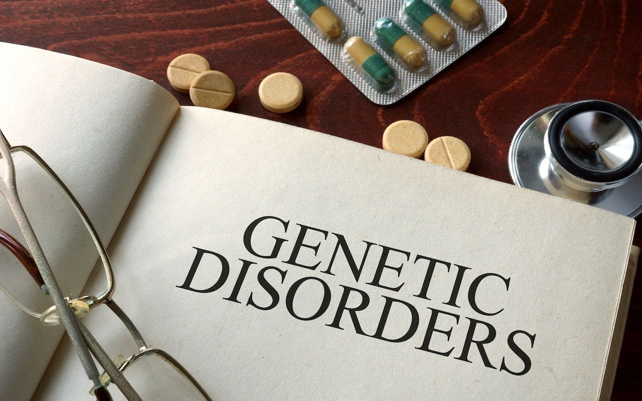 Book with diagnosis genetic disorders and pills. Medical concept: © Vitalii Vodolazskyi - stock.adobe.com