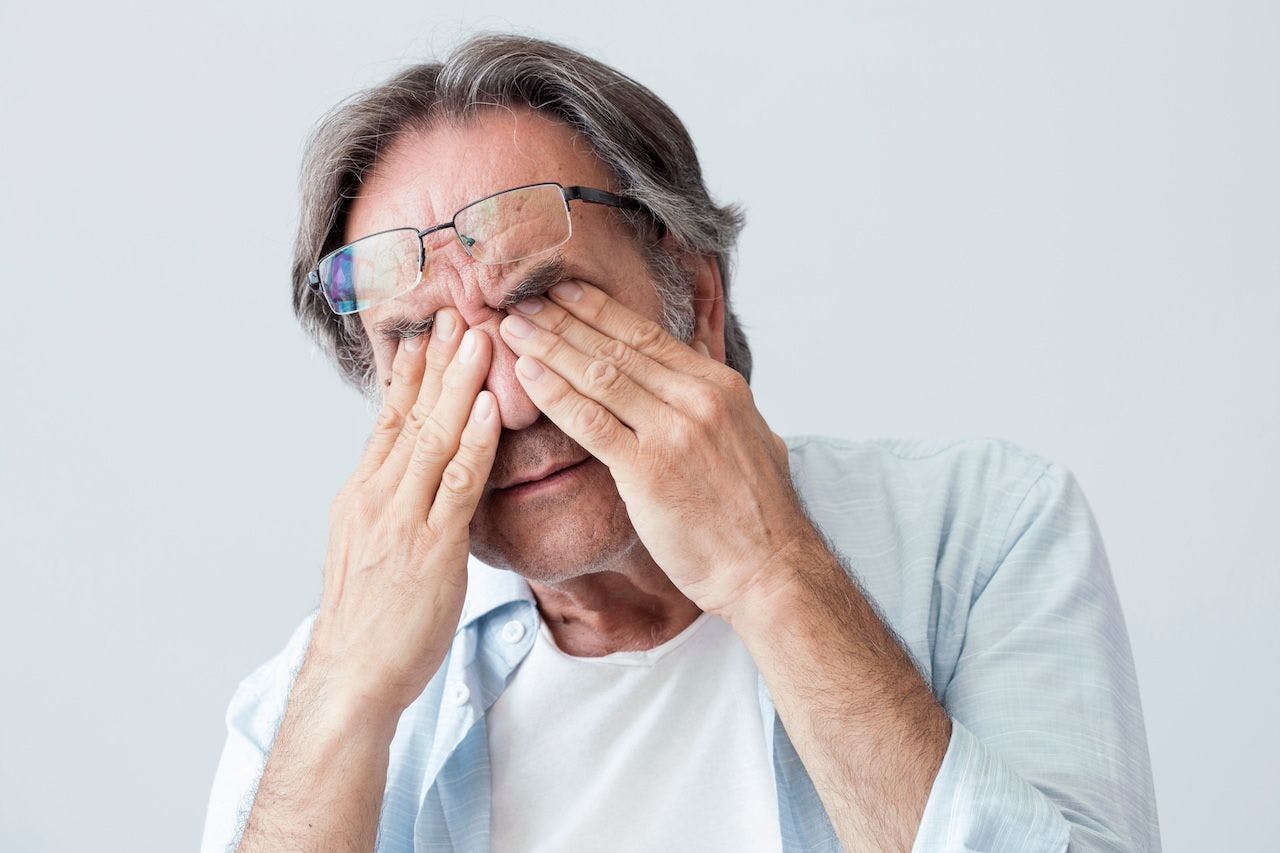 Old man with eye fatigue | Image credit: sebra - stock.adobe.com.jpeg