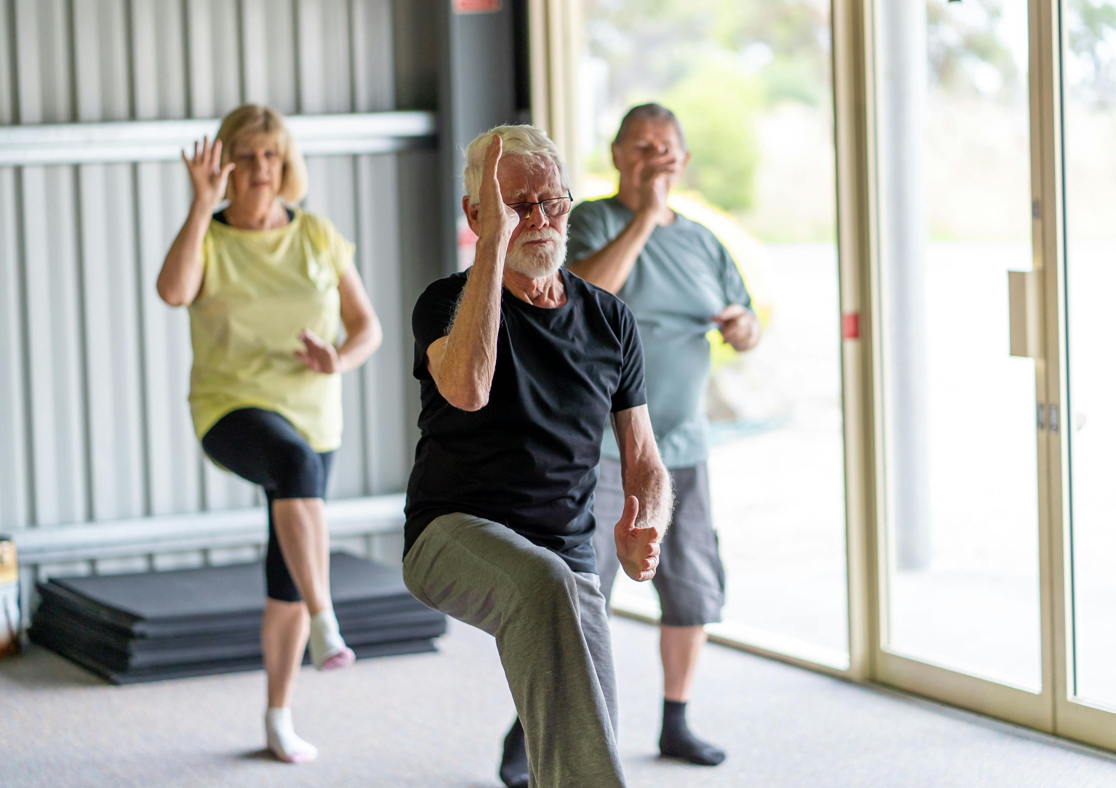 Group of elderly senior people practicing Tai chi class in age care gym facilities | Image credit: SB Arts Media - stock.adobe.com