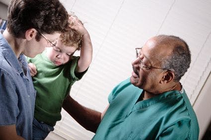 Image of doctor and pediatric patient