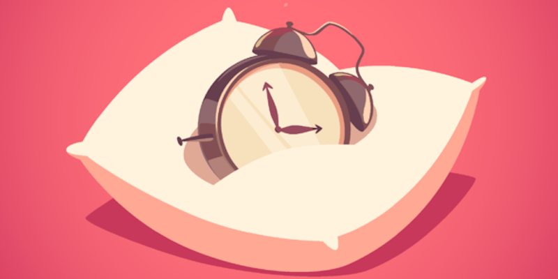 image of a clock on a pillow to represent sleep time