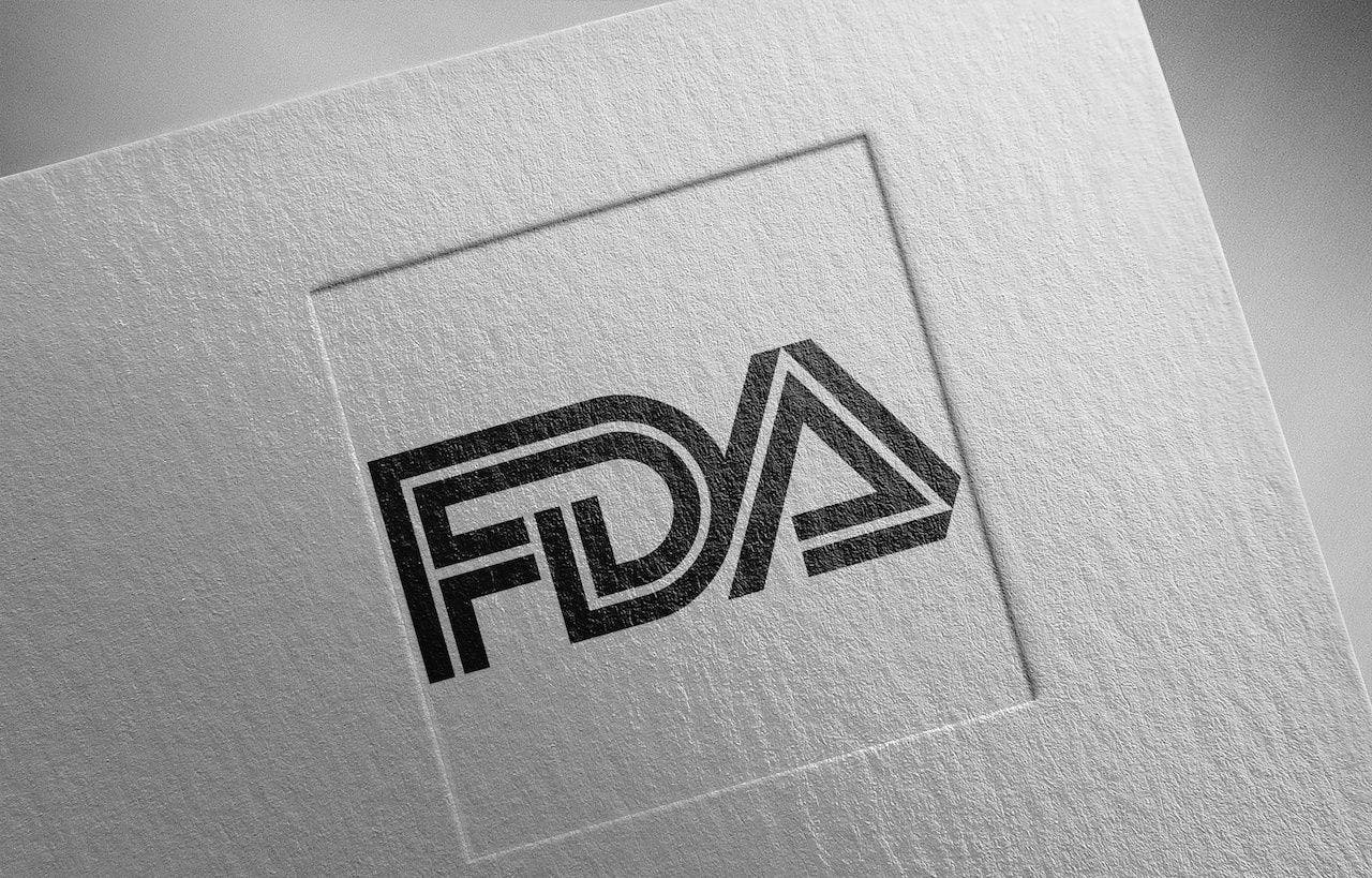 FDA logo on gray paper | Image credit: Araki Illustrations - stock.adobe.com