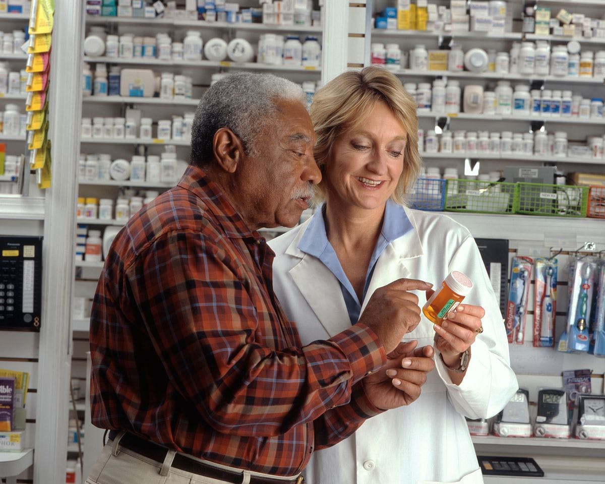 Older Black male at pharmacy