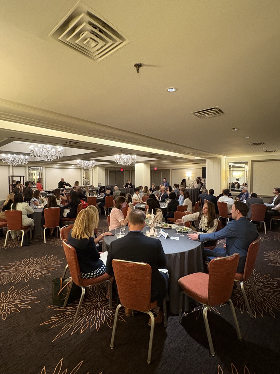 Healthcare professionals networking at roundtable conference