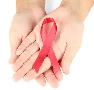 Hands holding red ribbon